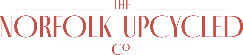 Logo of The Norfolk Upcycled Company in a dark coral colour